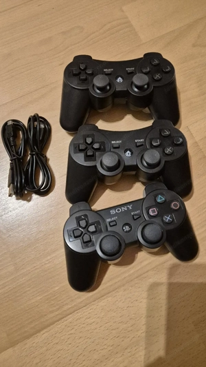 Playstation 3 mit 14 Games Bild 3