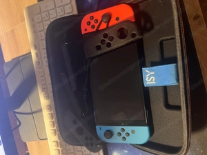 Nintendo Switch OLED mit EA FC 25, Human Fall Flat Bild 2