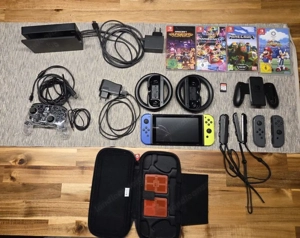 Nintendo Switch Konsole mit viel Zubehör und Spiele! Bild 2