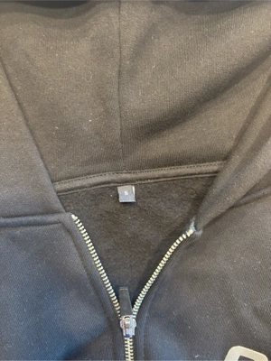 Schwarzer Zipper (oversized)  Bild 2