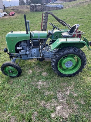 Steyr T80 mit Seilwinde und Mähwerk Bild 2