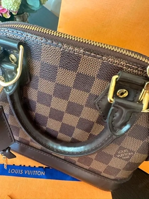 Louis Vuitton Alma BB Braun Bild 3