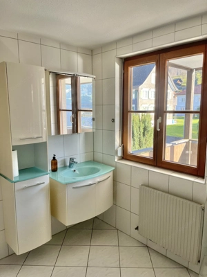 Sonnige 3-Zimmer Wohnung mit Tiefgarage im Dorfzentrum Bild 4