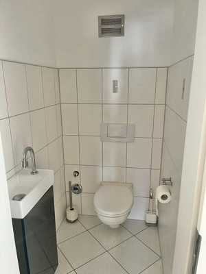 Sonnige 3-Zimmer Wohnung mit Tiefgarage im Dorfzentrum Bild 6