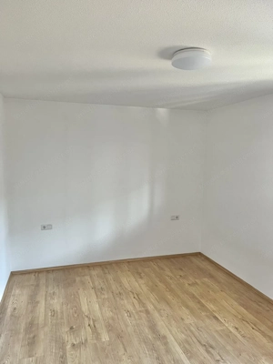 Sonnige 3-Zimmer Wohnung mit Tiefgarage im Dorfzentrum Bild 3