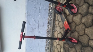 Zwei Scooter  Roller, Höhe des Lenkers ist auf drei verschiedene Höhen verstellbar. Höhen  Bild 3