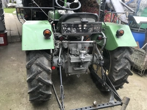 Biete Traktor Type 80 Mit stabielem Alu Anhänger Bild 2