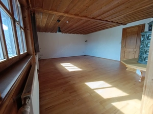 Charmante 3-Zimmer-Wohnung mit Kachelofen & Garten in ruhiger Sackgasse Bild 4