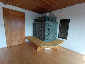 Charmante 3-Zimmer-Wohnung mit Kachelofen & Garten in ruhiger Sackgasse Bild 9