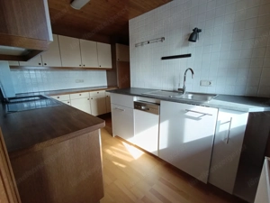 Charmante 3-Zimmer-Wohnung mit Kachelofen & Garten in ruhiger Sackgasse Bild 5