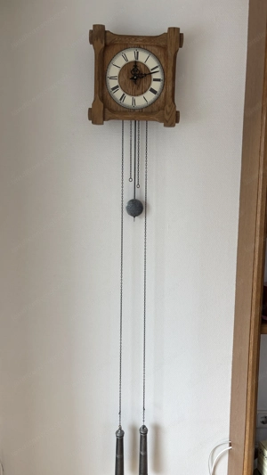 Schöne Wandpendeluhr