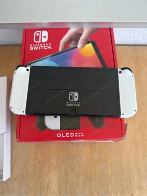 nintendo switch oled mit 3 spiele  Bild 2