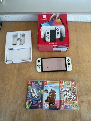 nintendo switch oled mit 3 spiele  Bild 4