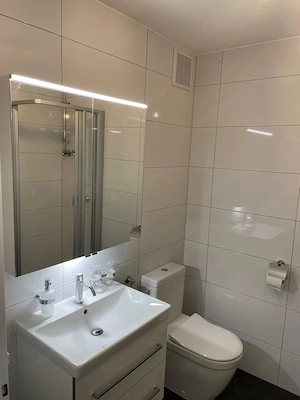 Lichtdurchflutete 2-Zimmer-Wohnung mit Balkon & Dachterrasse in zentraler Lage Bild 6