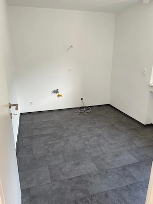 Lichtdurchflutete 2-Zimmer-Wohnung mit Balkon & Dachterrasse in zentraler Lage Bild 8