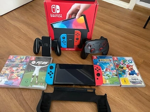 Nintendo Switch OLED inkl. 4 Spielen Bild 2