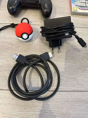 Nintendo Switch Pokémon Edition (Let's Go, Pikachu! inkl. Zubehör und vielen Spielen Bild 4