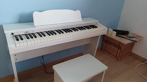Digitalpiano für Kinder mit 61 anschlagdynamischen Tasten Bild 2