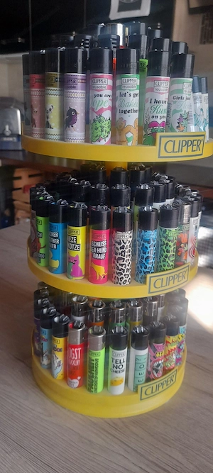 Unbenutzte Clipper Feuerzeuge mit Ständer  Bild 5