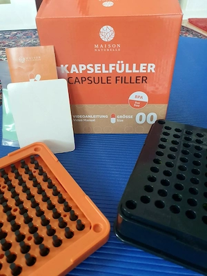 Kapselfüllmaschine und Leerkapseln