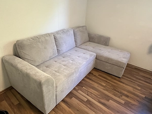 Graue Couch mit Courd Bild 2