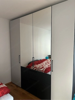 Kleiderkasten mit Spiegel und Schubladen Bild 3