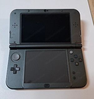 New Nintendo 3DS XL Metallic Black - OVP + Ladekabel + 2 Spiele (Mario & Monster Hunter) Bild 3