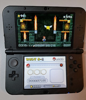 New Nintendo 3DS XL Metallic Black - OVP + Ladekabel + 2 Spiele (Mario & Monster Hunter) Bild 7