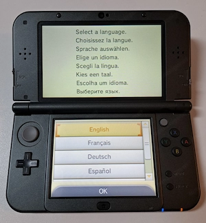 New Nintendo 3DS XL Metallic Black - OVP + Ladekabel + 2 Spiele (Mario & Monster Hunter) Bild 9