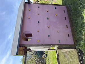 Spielhaus mit Doppelschaukel und Rutsche Bild 2