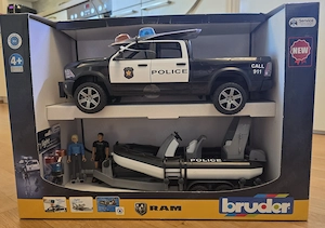 Bruder Dodge Ram mit Anhänger un Boot
