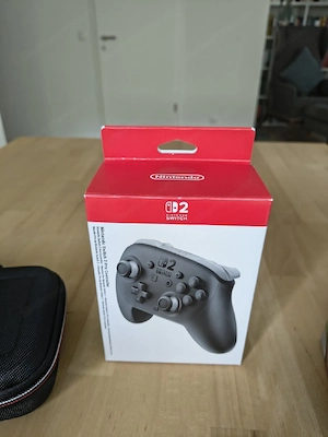 Nintendo Switch 2 Bundle: Konsole + Pro Controller + Case + 4 Spiele Bild 4