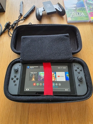 Nintendo Switch Komplettset + 4 Spiele + Zelda Amiibo + evtl. ungepatcht Bild 2