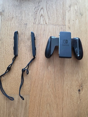 Nintendo Switch Komplettset + 4 Spiele + Zelda Amiibo + evtl. ungepatcht Bild 3