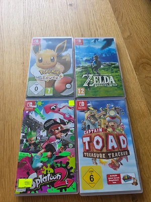 Nintendo Switch Komplettset + 4 Spiele + Zelda Amiibo + evtl. ungepatcht Bild 4