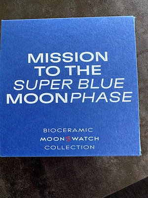 Scwatch X Omega MISSION to the Super Blue Moonphase Bild 2