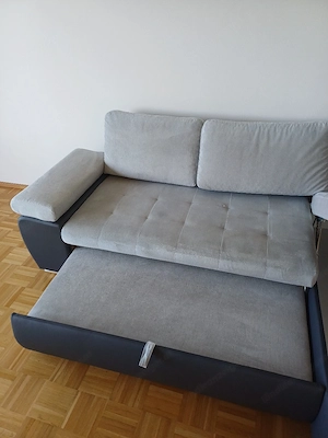 Gepflegte Couch mit Bettfunktion und Stauraum Bild 3