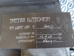Tattoo Gutschein wert 300e 