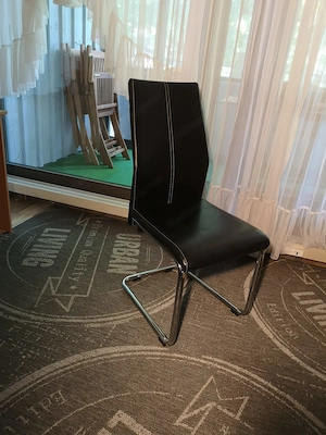 Esstisch mit 6 Leder-Schaukelstühlen Bild 6