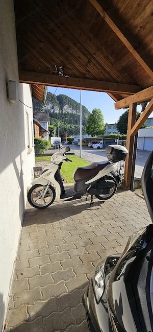 Suzuki UX 125ccm (Tüv Neu) Festpreis Bild 2