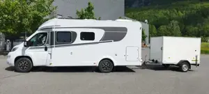 Wohnmobil Gespann Carado T334 + Humer Unsinn Anhänger