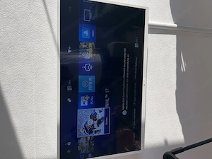 Playstation 4 mit Controller und Spielen Bild 3
