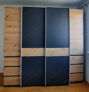 Kleiderschrank mit 2 Dreh- und Schwebetüren und 6 Schubladen  Bild 2