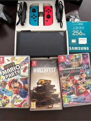 Nintendo Switch Oled mit viel Zubehör Bild 2