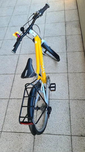 Gelbes Woom 4 Kinderfahrrad Bild 2