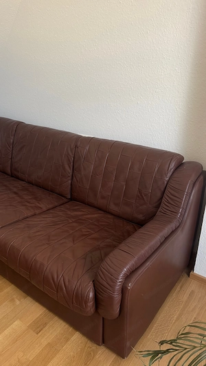 Braune Ledercouch mit passendem Ledersessel Bild 4