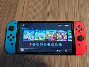 Nintendo Switch OLED-Modell Neon-Rot Neon-Blau 64GB + 9 Spiele Bild 5