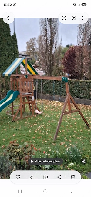Kinderspielolatz, zwei Schaukeln ,Ringe und Rutsche