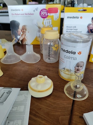 Medela Fläschchen, Calma, Milchpumpe Harmony und umfangreiches Zubehör  Bild 2