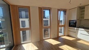 Hochwertige 2-Zimmer-Wohnung mit großzügiger überdachter Terrasse und freier Sicht auf die Berge Bild 2